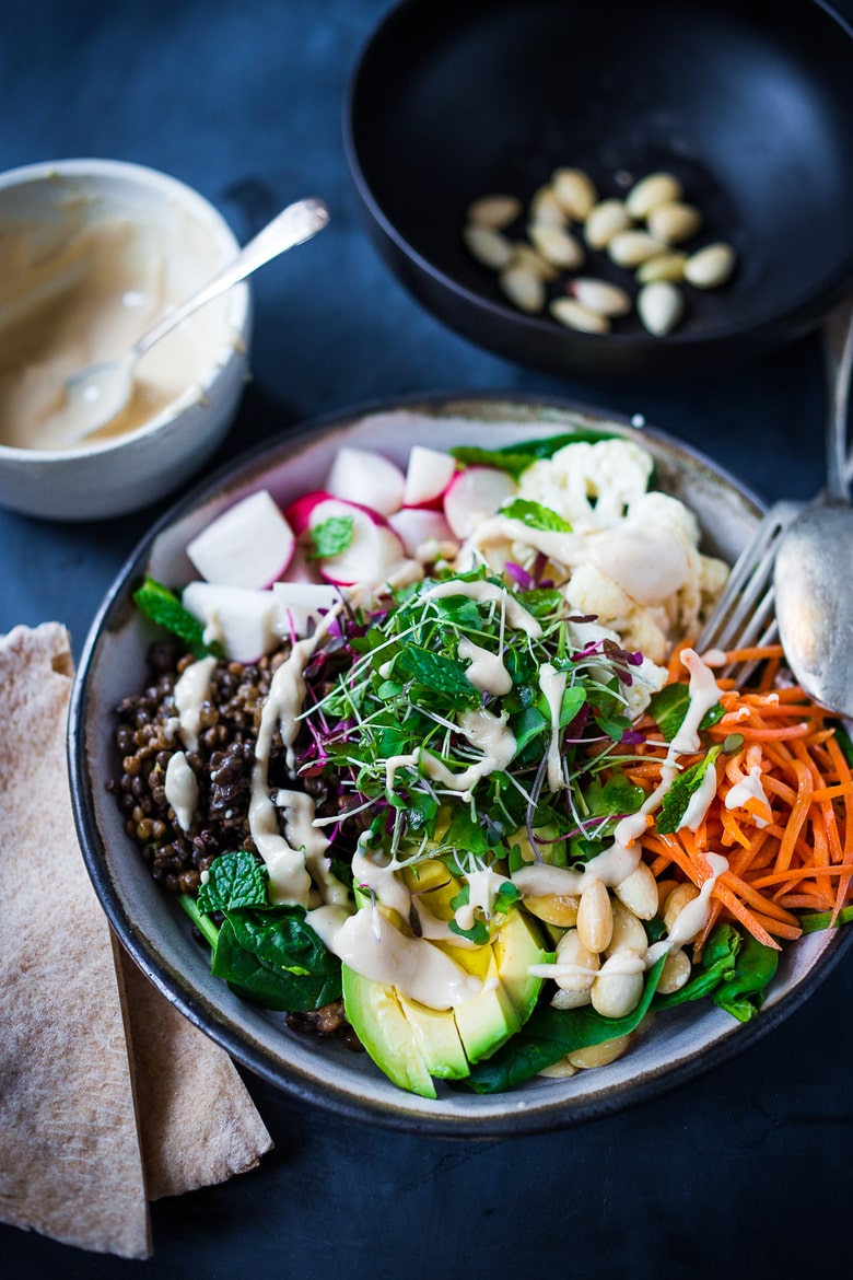 Lentil Bowls - a healthy veggie bowl with lentils, seasonal veggies, almonds, avocado and Tahini dressing. Vegan and GF #buddhabowl #veganbowl #lentil #lentilbowl |www.feastingathome.com