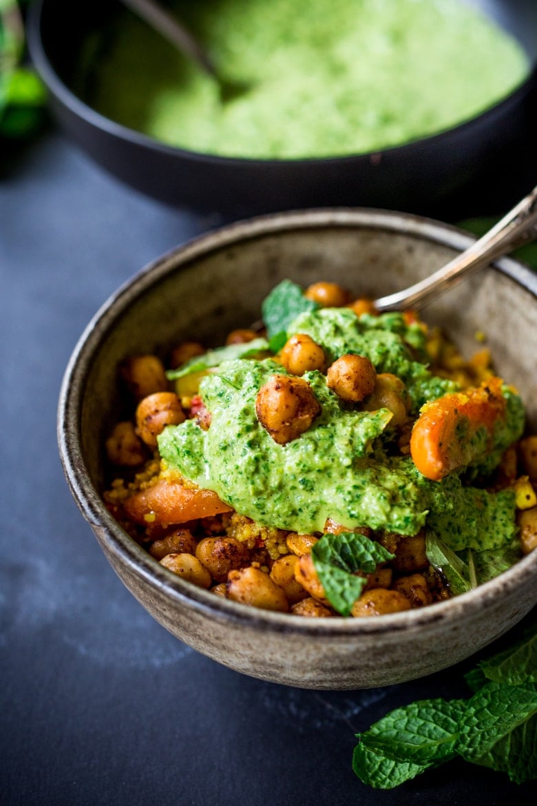 A delicious Tunisian-inspired Tagine (with your choice of  Chicken or chickpeas)  Carrots, Cous Cous and flavorful Green Harissa Sauce. A one-pan meal that can be made in 45 minutes! Vegan and Gluten-free adaptable!   | www.feastingathome.com #tunisian #chicken #chickpeas #couscous #moroccan #moroccanchicken #tagine 