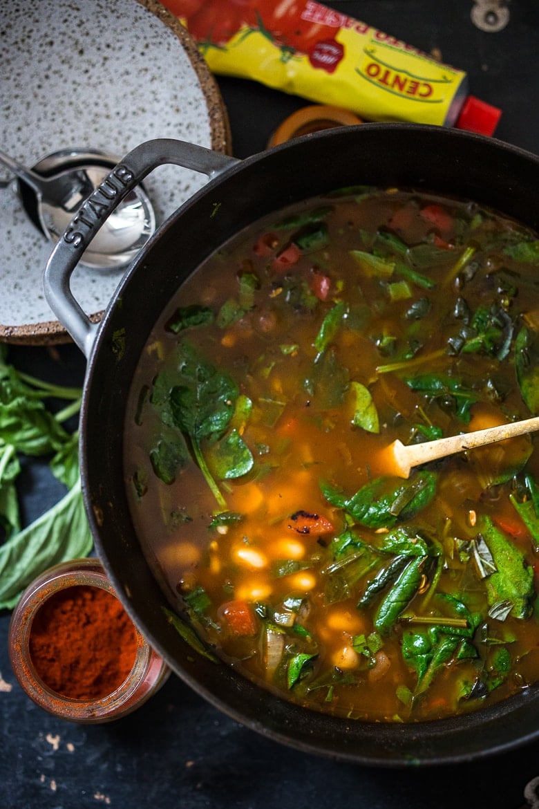 ( Vegan) Smoky Tomato Broth- a healing detoxing pot of soup- with beans, vegan "meat balls", spinach, pasta, or make it your own. Nutritious and cleansing. Vegan, Gluten Free. | www.feastingathome.com