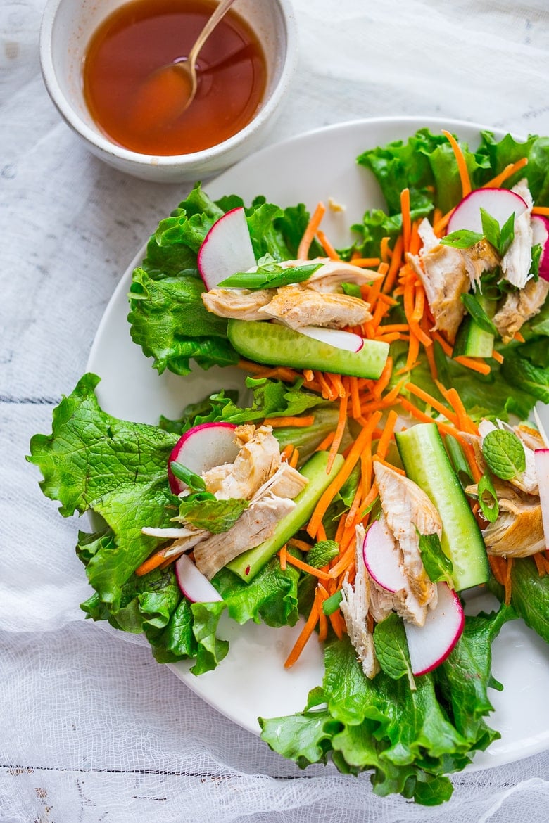 Vietnamese Chicken Lettuce Wraps, made with healthy veggies and your choice of chicken or tofu! Serve these up as a light and healthy appetizer or a refreshing lunch! #lettucewraps #healthyappetizers #partyappetizers www.feastingathome.com