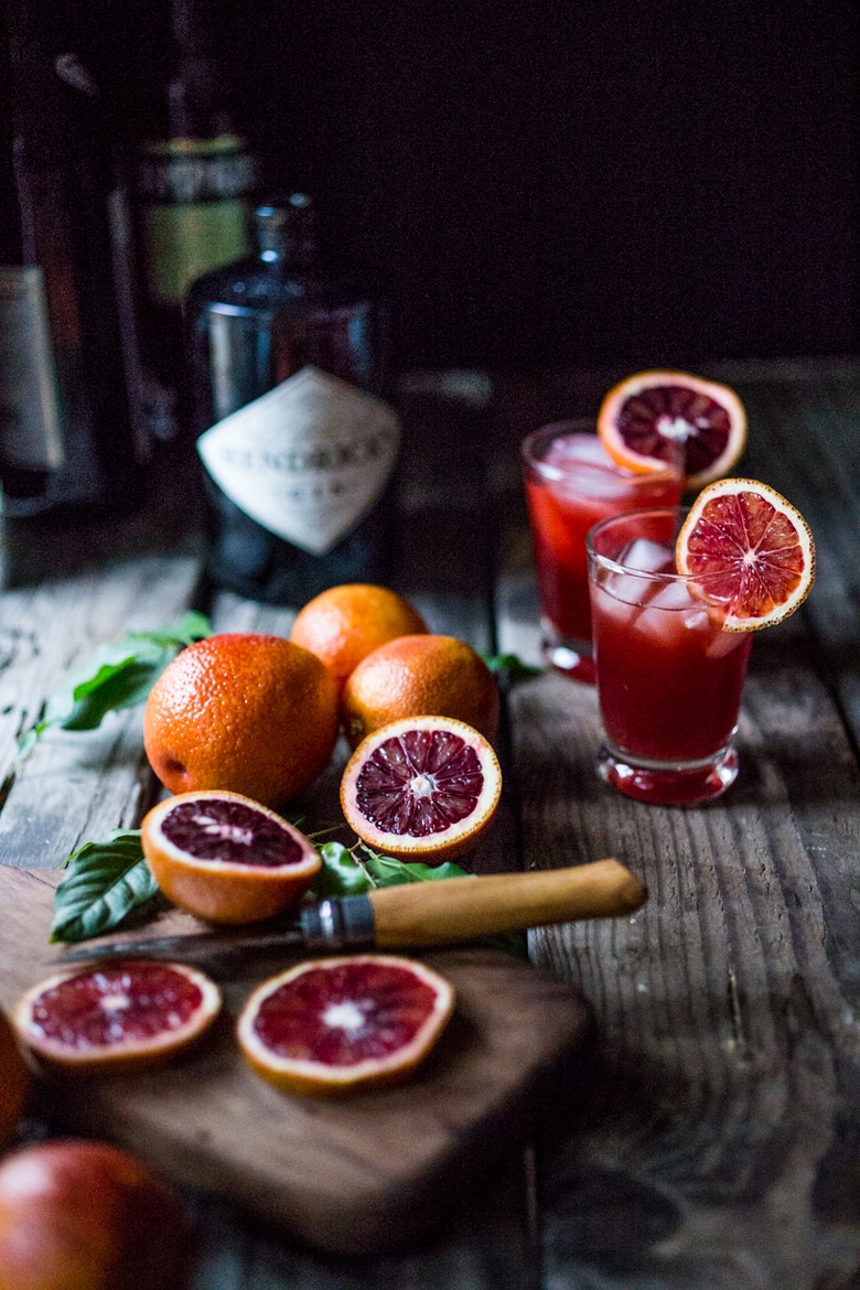 A Negroni is a classic Italian cocktail made up of Gin, Campari and Sweet Vermouth. Here we've simply substituted a blood orange instead of a regular orange for a more festive presentation. Shaken with ice and strained into a little glass -- it's one of my favorites.