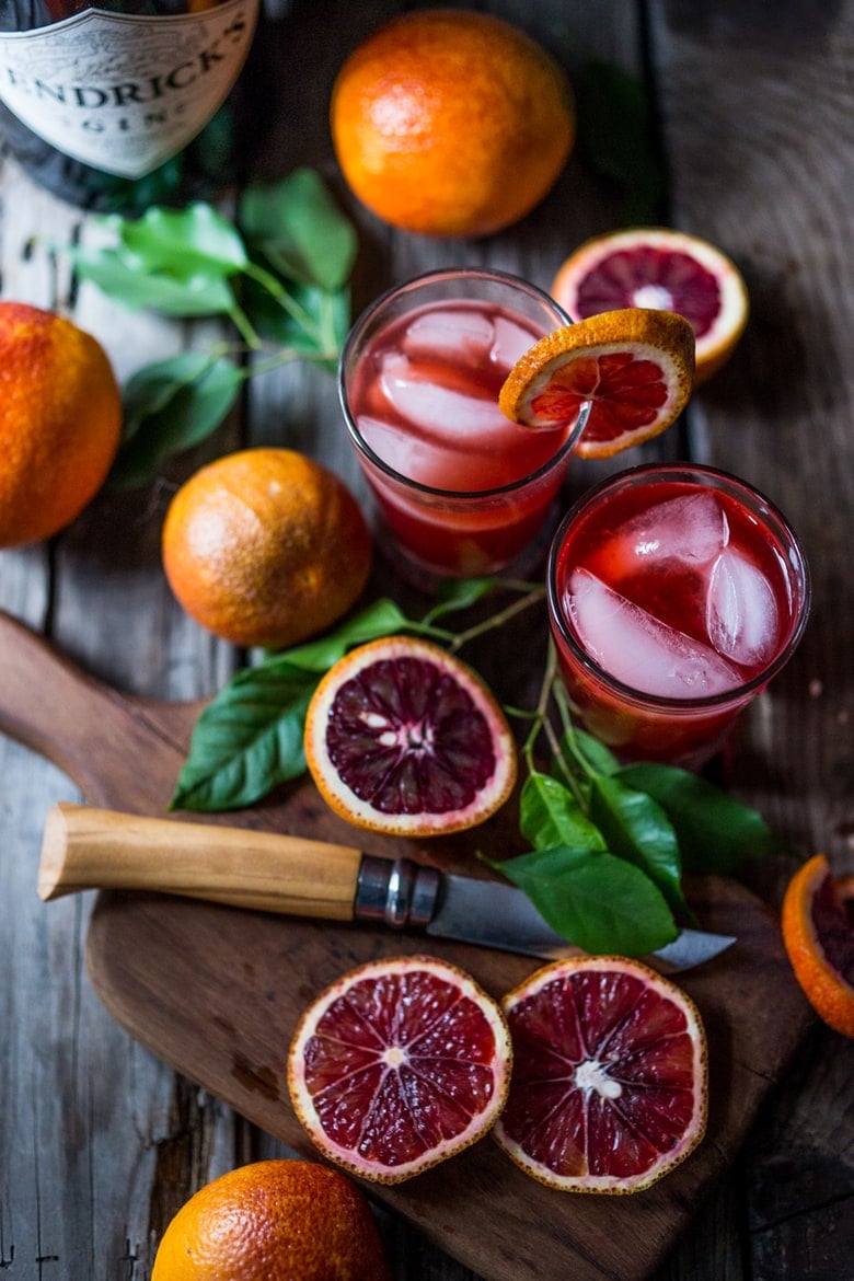 A Negroni is a classic Italian cocktail made up of Gin, Campari and Sweet Vermouth. Here we've simply substituted a blood orange instead of a regular orange for a more festive presentation. Shaken with ice and strained into a little glass -- it's one of my favorites.