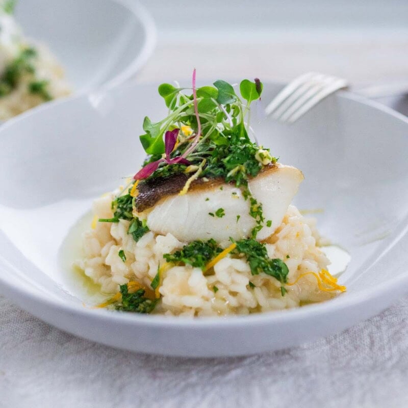 Cod risotto in a bowl.