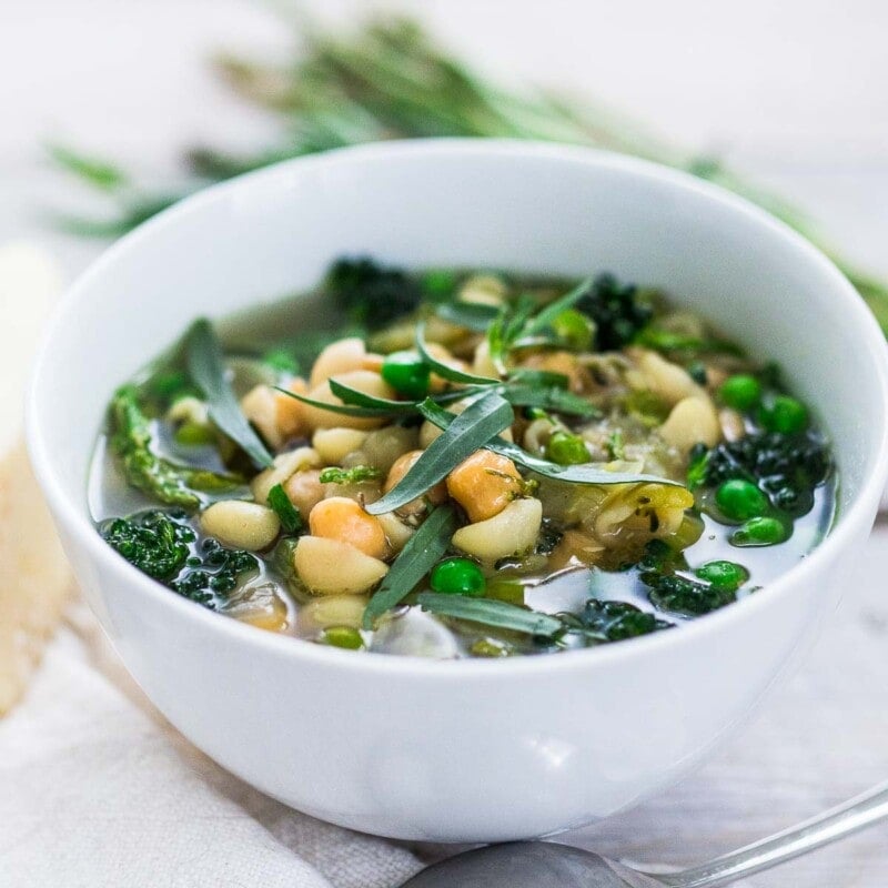 A delicious recipe for Spring Minestrone Soup with Chickpeas and vibrant spring green vegetables. Keep it vegetarian or make it vegan- a simple adaptable recipe that makes for a healthy weeknight dinner. 