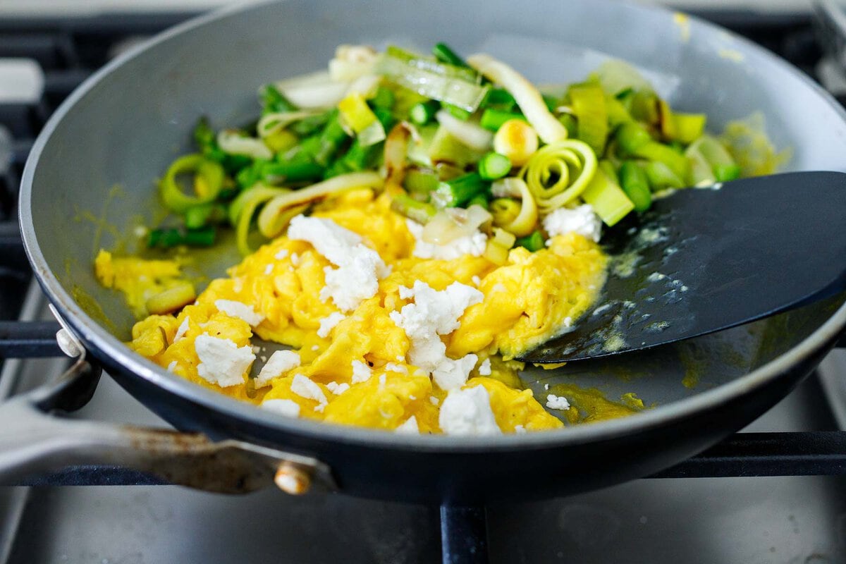 scrambling eggs with goat cheese