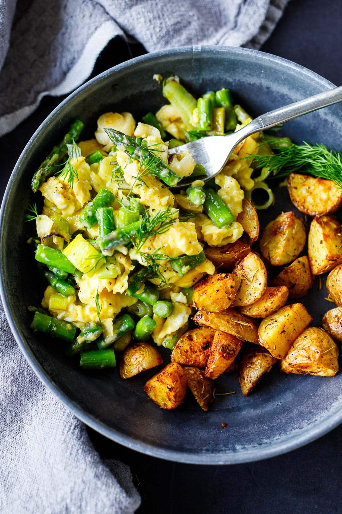 Soft fluffy Scrambled eggs recipe with asparagus and leeks