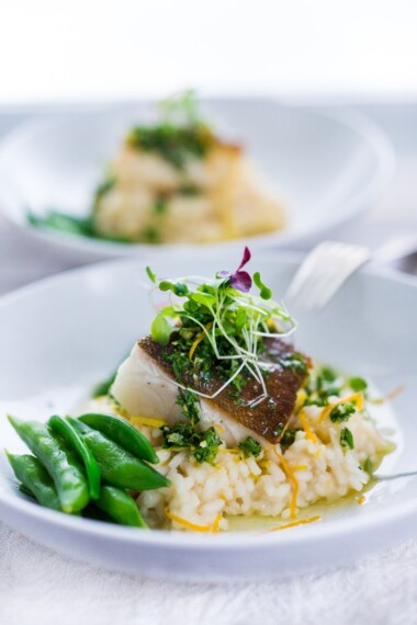 Seared Black Cod (or halibut, sea bass or scallops) with Meyer Lemon Risotto and Gremolata- a flavorful Italian herb sauce. | #seabass #halibut #risotto #meyerlemon #gremolata ww.feastingathome.com