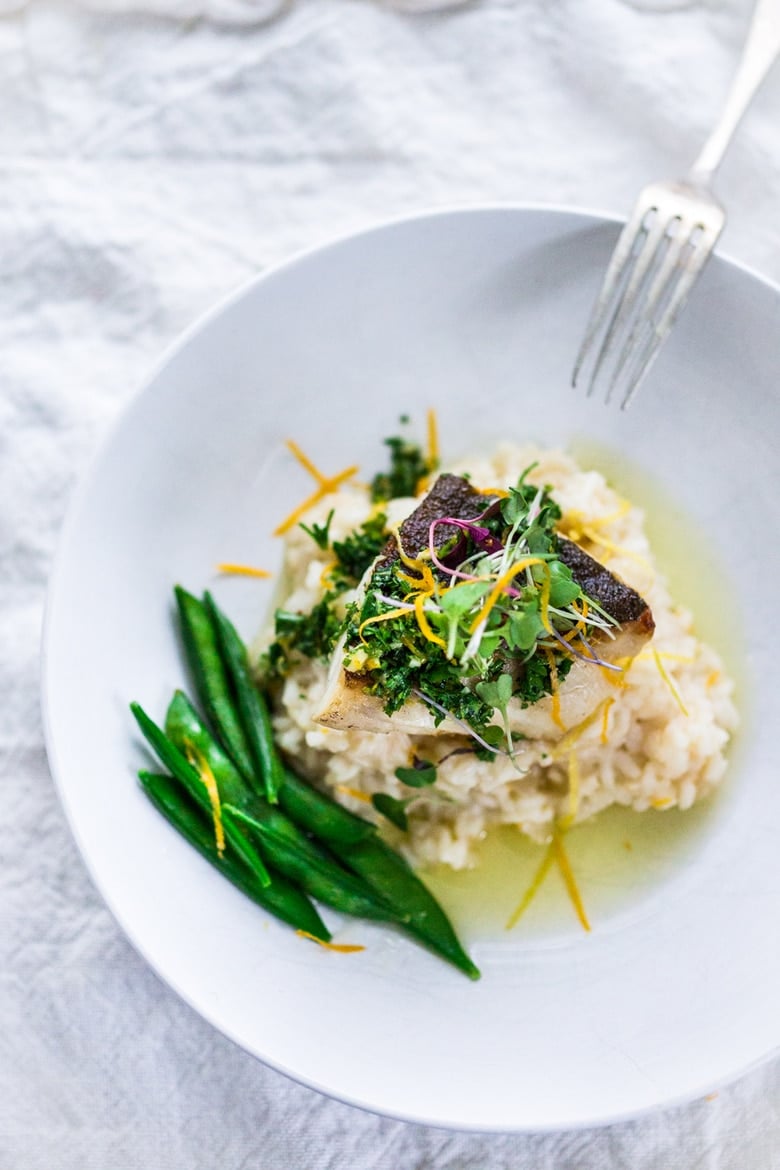 A simple delicious recipe for Seared Black Cod (or halibut, sea bass or scallops) served atop a lightened up Meyer Lemon Risotto drizzled with  Gremolata.  A perfect date-night dinner! 