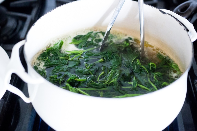 How to cook nettles! Steamed Nettles w/ Toasted Sesame Seeds, Sesame oil and Chives. Easy, delicious and detoxifying! Full of calcium and iron. #nettles #Vegan | www.feastingathome.com