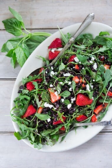 Strawberry Basil and Black Rice Salad with Arugula and Goat cheese, and a Balsamic Maple dressing. | www.feastingathome.com