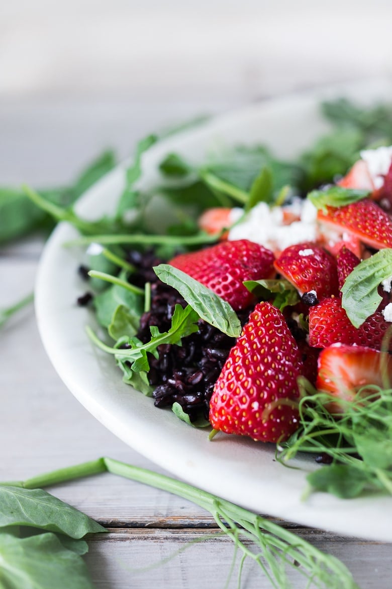 Strawberry Arugula Salad with Basil and Black Rice... with Goat cheese and a simple Balsamic Maple dressing. | www.feastingathome.com