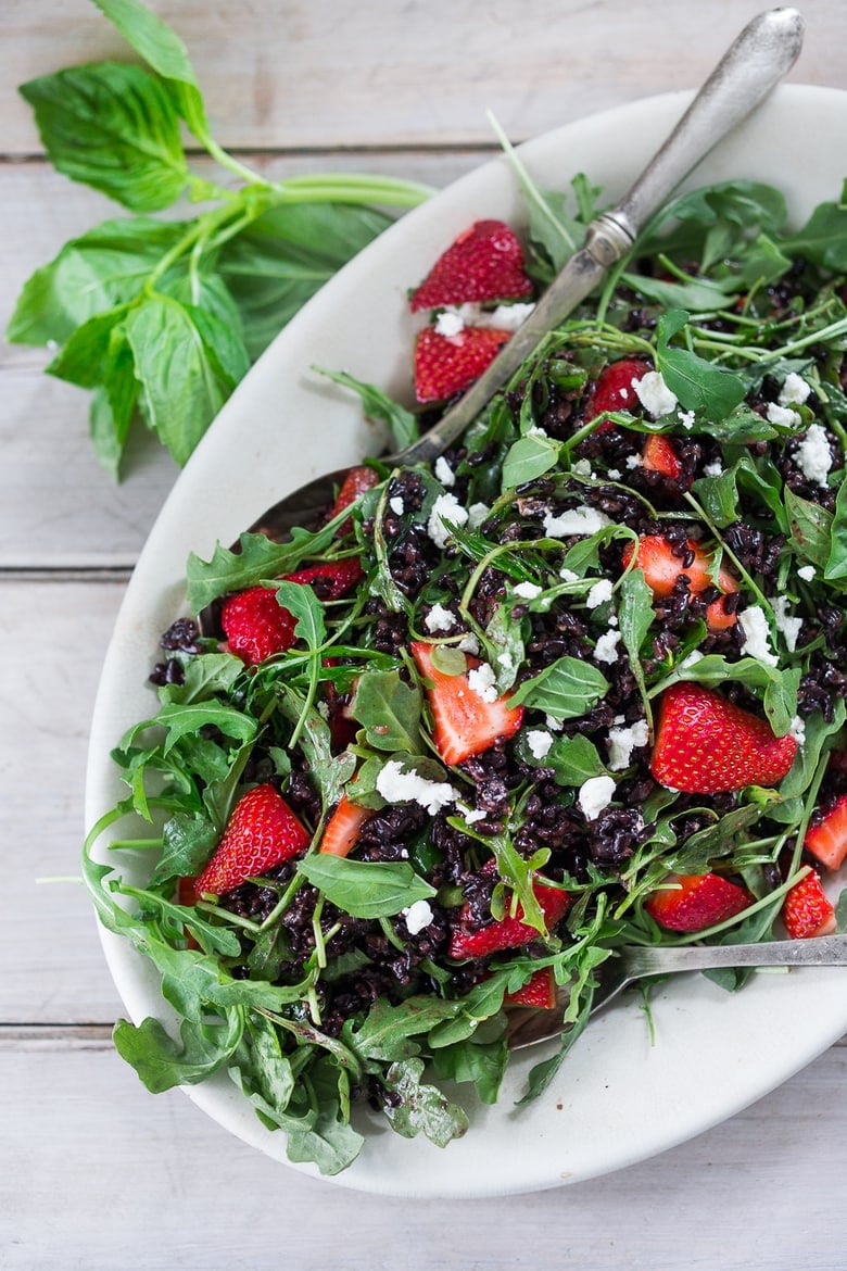 Strawberry Arugula Salad with Basil and Black Rice... with Goat cheese and a simple Balsamic Maple dressing. | www.feastingathome.com