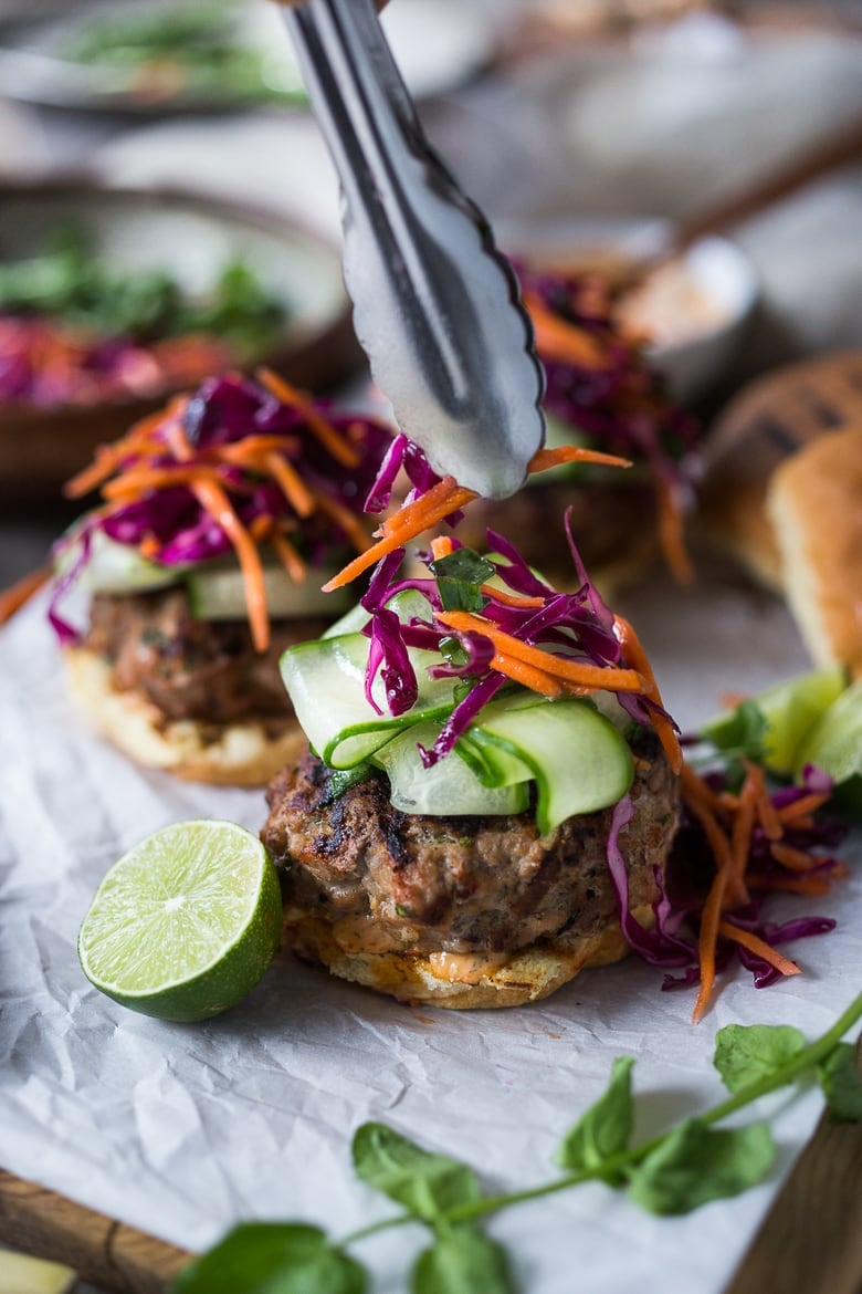 Thai Turkey Burgers- with lemongrass, ginger & basil, topped w/ a Crunchy Asian Slaw and Spicy Aioli. Light, healthy, FLAVORFUL! Easy to make. | www.feastingathome.com #thaiturkeyburger #thaiburger #turkeyburger