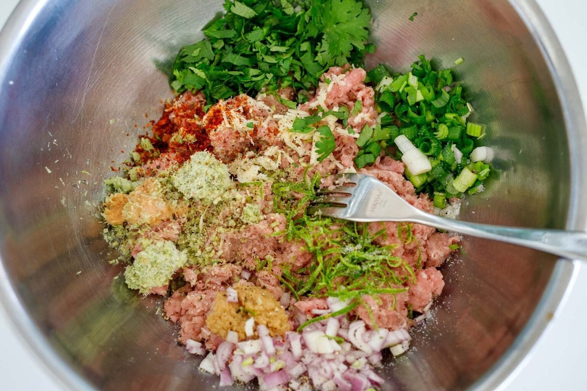 Turkey burger ingredients in a bowl.