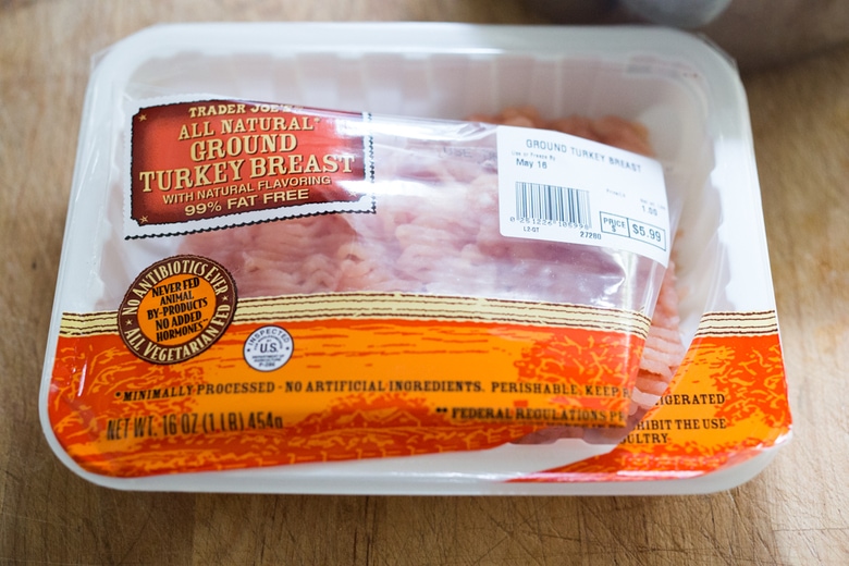 all natural ground turkey breast in packaging on counter.