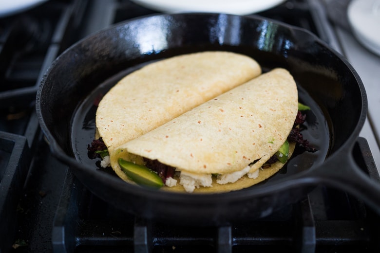 Vegetarian Hibiscus Flower Quesadillas- so "meaty" and delicious, the flowers are sauted with onion and garlic and add great texture and flavor! | www.feastingathome.com