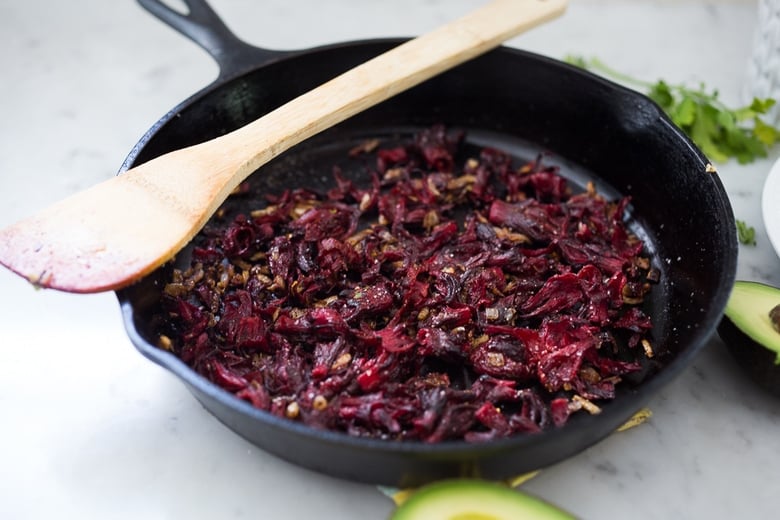 Vegetarian Hibiscus Flower Quesadillas- so "meaty" and delicious, the flowers are sauted with onion and garlic and add great texture and flavor! | www.feastingathome.com