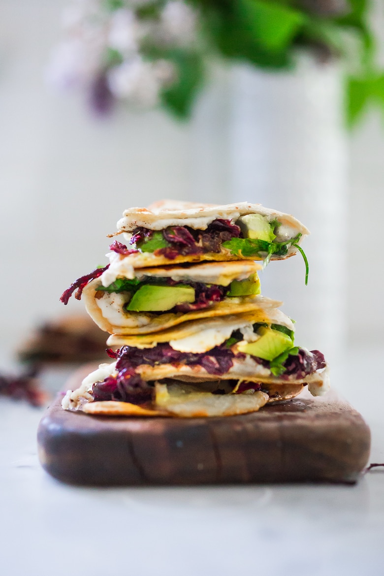 Vegetarian Hibiscus Flower Quesadillas- so "meaty" and delicious, the flowers are sauted with onion and garlic and add great texture and flavor! | www.feastingathome.com