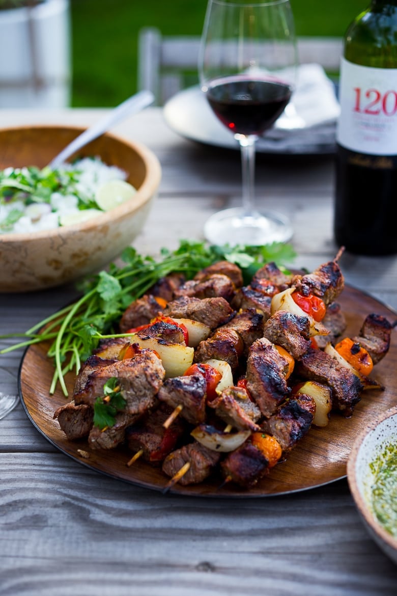 Grilled Chilean Beef Kabobs with Chimichurri Sauce and Cilantro Rice. An easy flavorful weeknight meal. | www.feastingathome.com #beef #skewers #chimichurri #grilling #kabobs #beefkabobs