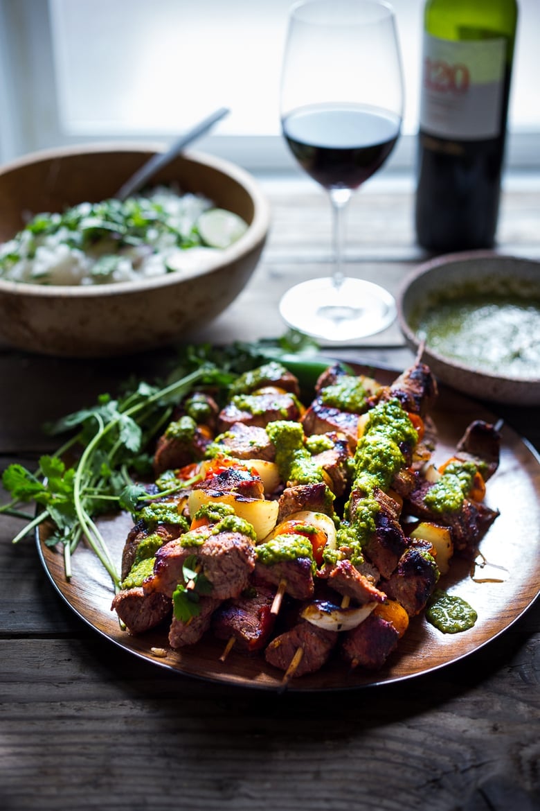 Grilled Chilean Beef Kabobs with Chimichurri Sauce and Cilantro Rice. An easy flavorful weeknight meal. | www.feastingathome.com #beef #skewers #chimichurri #grilling #kabobs #beefkabobs