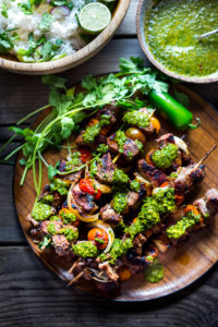 Grilled Chilean Beef Skewers with Smoky Chimichurri Sauce and Cilantro Rice. An easy flavorful weeknight meal. | www.feastingathome.com