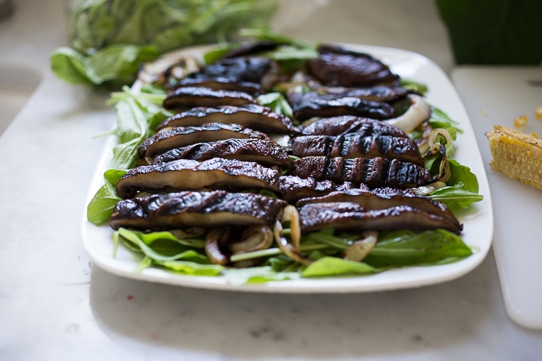 A simple tasty recipe for Grilled Portobello Steak Salad with grilled sweet onions, grilled corn, tomatoes, avocado and Smokey Lime Dressing. Vegan GF