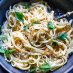 A simple, delicious recipe for Cacio e Pepe - a fast and flavorful- four-ingredient pasta recipe that can be topped with your favorite seasonal veggie (or protein!).