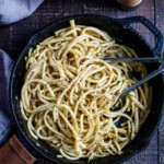 A simple, delicious recipe for Cacio e Pepe - a fast and flavorful- four-ingredient pasta recipe that can be tossed with your favorite seasonal veggie and made in 20 minutes! 