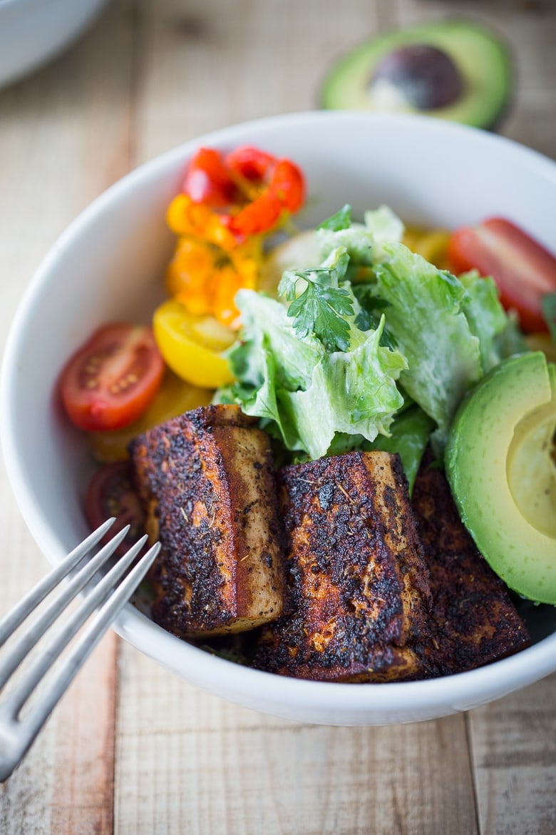 Vegan Ceasar Salad with Blackened Cajun Tofu dressed in a creamy caesar dressing  that is dairy-free, nut-free and low in calories! #vegancaesar #vegancaesardressing #vegansalad