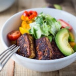 Vegan Ceasar Salad with Blackened Cajun Tofu dressed in a creamy caesar dressing that is dairy-free, nut-free and low in calories! #vegancaesar #vegancaesardressing #vegansalad
