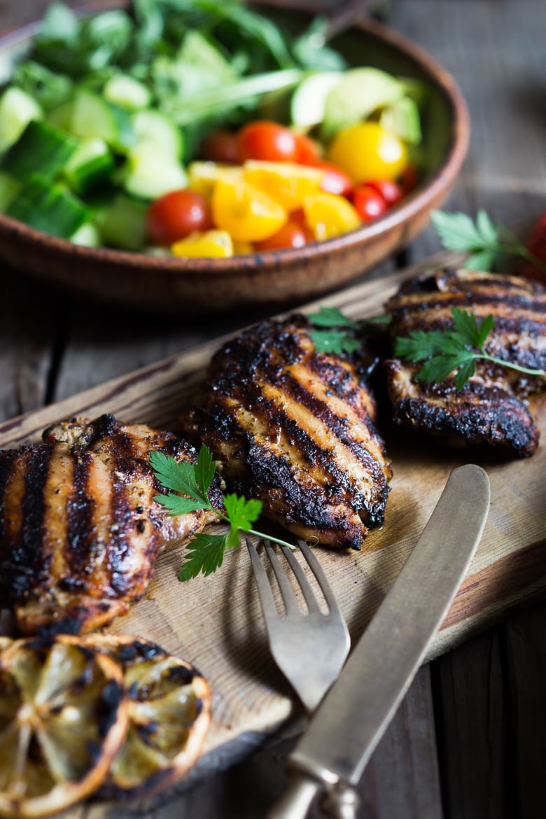 A simple tasty recipe for Grilled Greek Souvlaki Bowl with Cauliflower Rice, flavorful Cucumber Yogurt Sauce and fresh summer vegetables. This can be made with Grilled Chicken or Grilled Portobellos! | www.feastingathome.com