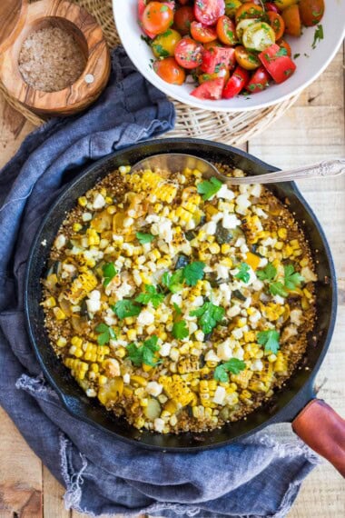 Baked Quinoa with Zucchini, Corn and feta, topped with a fresh Tomato Relish. A healthy, easy vegetarian dinner recipe- a delicious way to use up all your farmers market veggies!