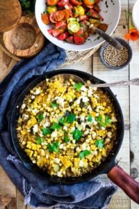 Baked Quinoa with Zucchini, Corn and feta, topped with a fresh Tomato Relish. A healthy, easy vegetarian dinner recipe, perfect for summer! #bakedquinoa #quinoabake #corn #zucchinirecipes