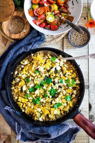Baked Quinoa with Zucchini, Corn and feta, topped with a fresh Tomato Relish. A healthy, easy vegetarian dinner recipe, perfect for summer! #bakedquinoa #quinoabake #corn #zucchinirecipes