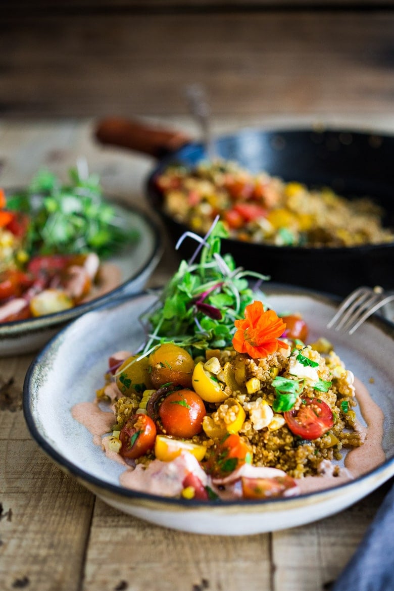 Baked Quinoa with Zucchini, Corn and feta, topped with a fresh Tomato Relish. A healthy, easy vegetarian dinner recipe, perfect for summer! #bakedquinoa #quinoabake #corn #zucchinirecipes 