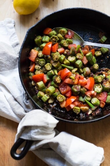 This Okra Recipe is infused with flavors of the Middle East. It's my Egyptian father's recipe made with onion, garlic, tomatoes and flavorful Middle Eastern Spices. 