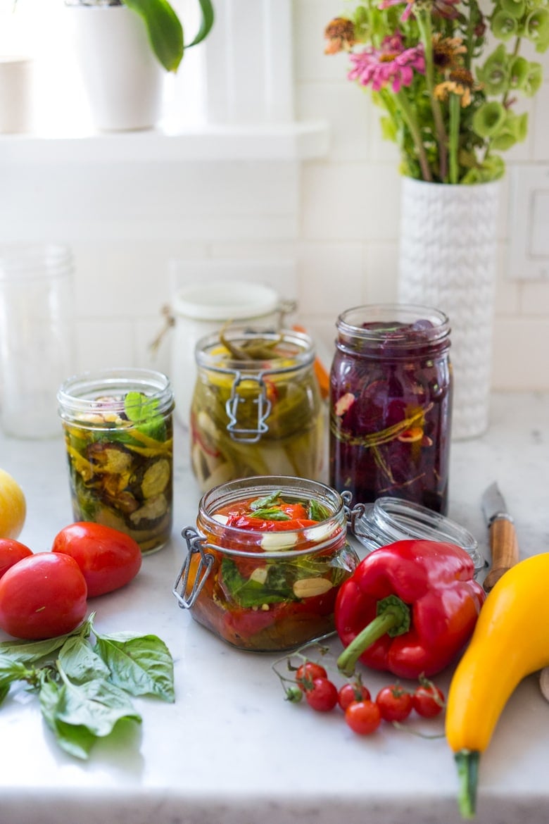 Quick Marinated Veggies! Extend summer's bounty by Preserving Veggies in Olive Oil- serve with Cheese or Charcuterie boards and Mezze Platters. Delicious, quick & simple! | www.feastingathome.com