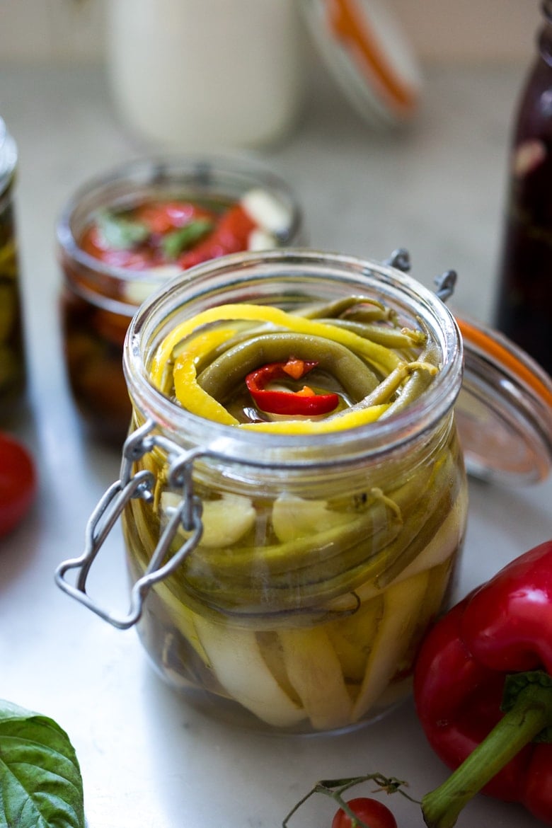 Quick Marinated Veggies! Extend summer's bounty by Preserving Veggies in Olive Oil- serve with Cheese or Charcuterie boards and Mezze Platters. Delicious, quick & simple! | www.feastingathome.com