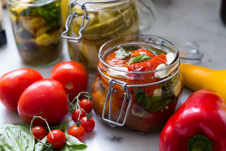 Quick Marinated Veggies! Extend summer's bounty by Preserving Veggies in Olive Oil- serve with Cheese or Charcuterie boards and Mezze Platters. Delicious, quick & simple! | www.feastingathome.com