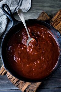 This homemade BBQ sauce recipe is  easy to make, in just 25 minutes! It's deep and smoky, tangy, sweet with a little bit of heat. Vegan, gluten-free adaptable! 