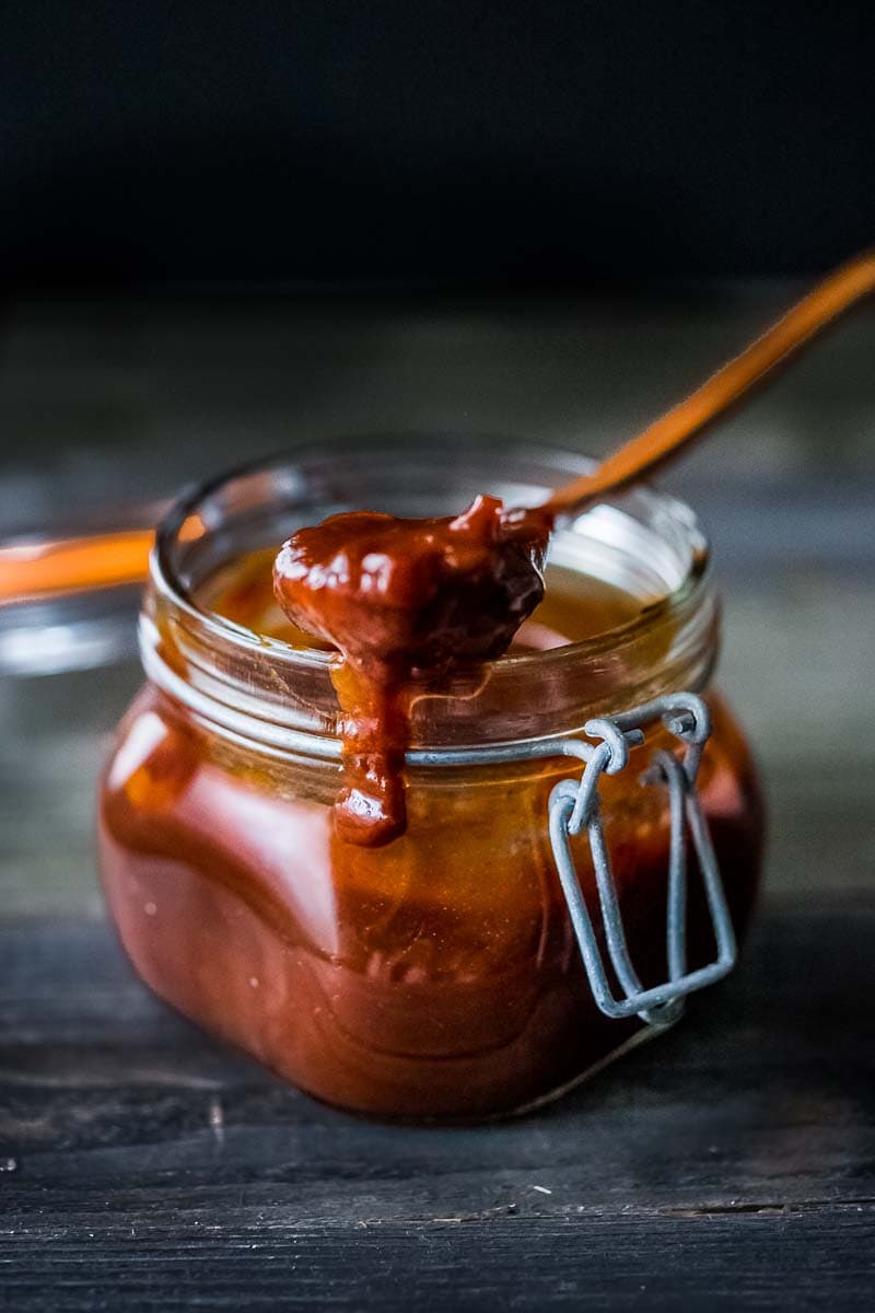 This homemade BBQ sauce recipe is  easy to make, in just 25 minutes! It's deep and smoky, tangy, sweet with a little bit of heat. Vegan, gluten-free adaptable! 