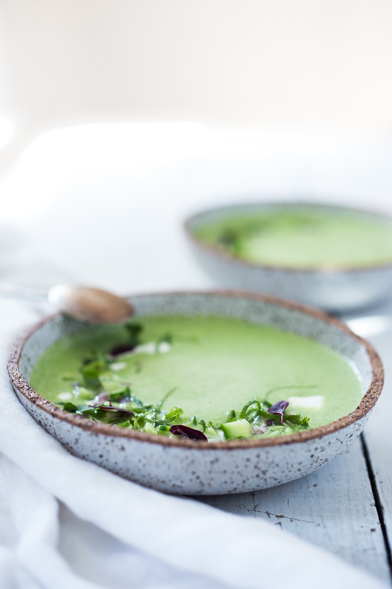 Cool and refreshing Cucumber Gazpacho with yogurt, cilantro, coriander and lime. Top this with shrimp or keep it vegetarian! So tasty. #gazpacho #cucumbergazpacho #cucumbersoup #coldsoup #chilledsoup 