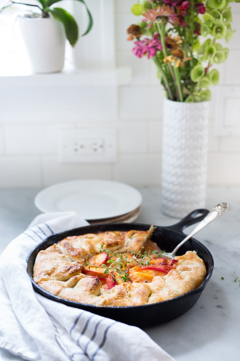 An old fashioned, Farm Style Peach Skillet Pie-- a very simple, easy and fast recipe that comes out perfect every time! | www.feastingathome.com