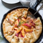 An old fashioned, Farm Style Peach Galette baked in a skillet. A simple, easy and fast recipe that comes out perfect every time! | www.feastingathome.com