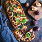 This delicious Fig Pizza with balsamic onions, creamy gorgonzola cheese, and fresh arugula is the perfect combination of flavors! Bake it or grill it, either way, you'll love this fall-inspired vegetarian pizza!
