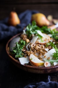 A delicious recipe for Farro Salad with pear, hazelnuts and arugula, keep it vegan or add pecorino. Either way it's a tasty fall salad!