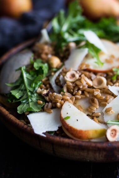 A delicious recipe for Farro Salad with pear, hazelnuts and arugula, keep it vegan or add pecorino. Either way it's a tasty fall salad!