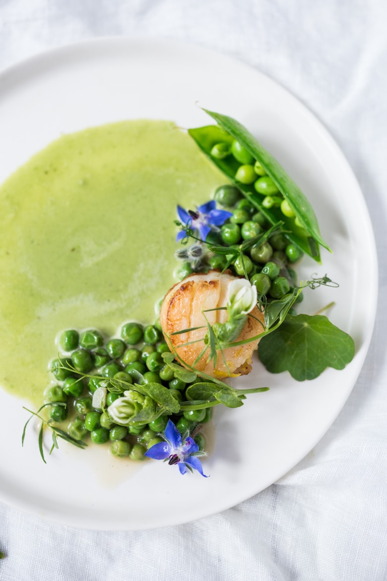 Seared Scallops with Spring peas, tarragon and truffle oil– a light and elegant meal, perfect for entertaining or special occasions.