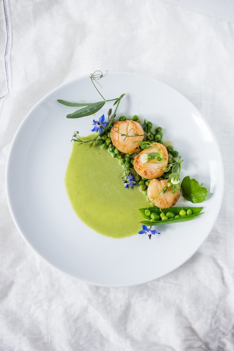 Seared Scallops with Spring Peas and Tarragon, a simple elegant dinner using fresh spring peas. | www.feastingathome.com