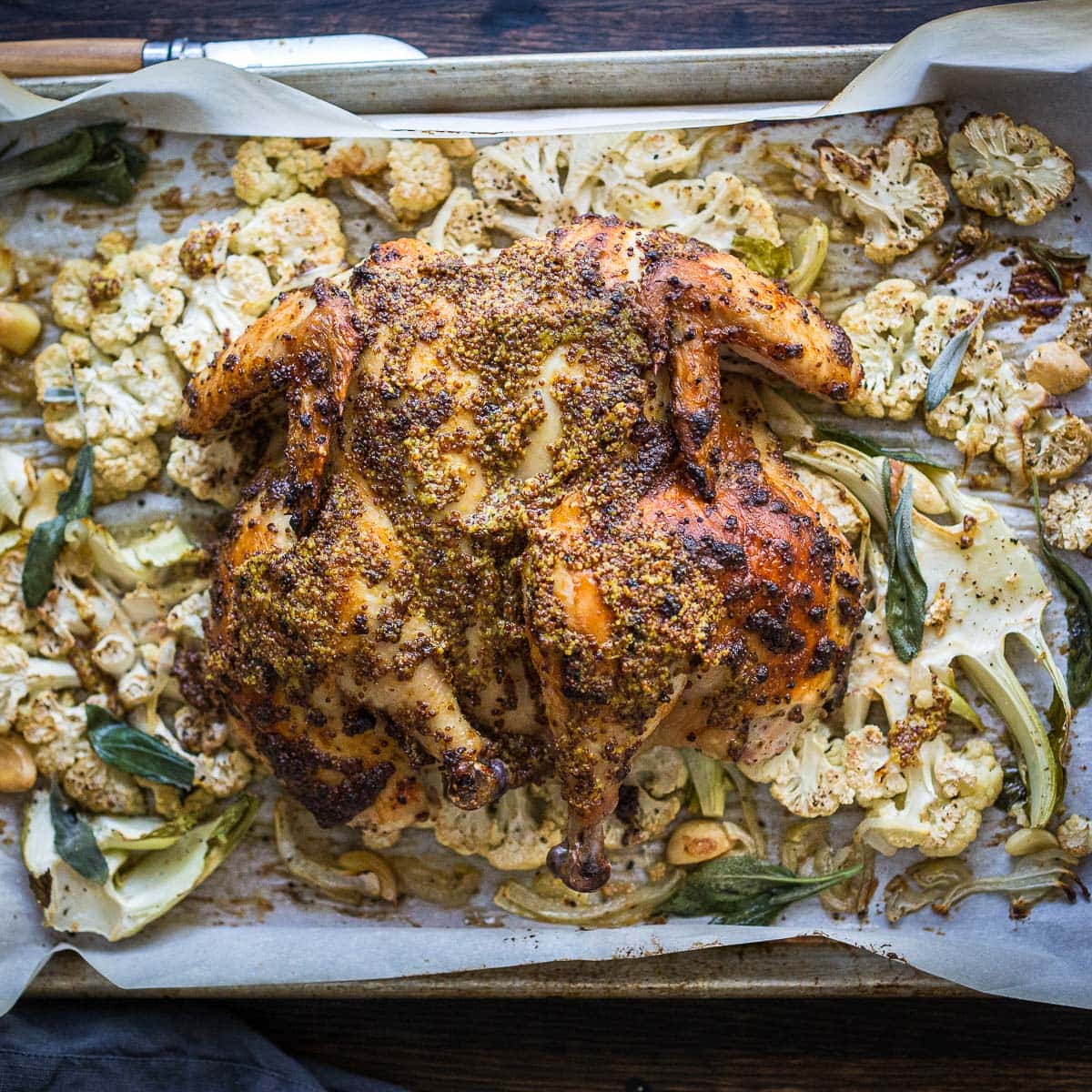 The roasted spatchcock chicken over roasted cauliflower steaks- perfect golden and delicious looking. 